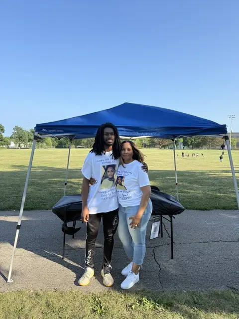 Welcoming families at the KJ Day check-in tent