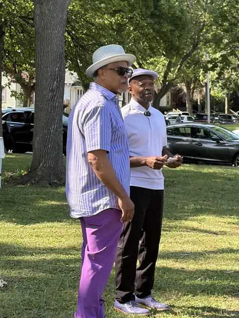 Community elders sharing a moment of fellowship